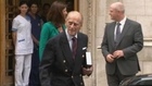 Smiling Prince Philip leaves UK hospital after operation