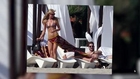 Paris Hilton's Dog Tries to Reveal Her Bikini Body